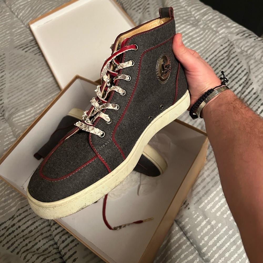 Size 43.5 Christian Louboutin men’s red bottom shoes.
